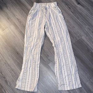 White pants with black stripes from the brand Sienna Sky!